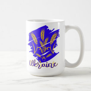 Ukrainskt nationalsymbol tryzub gjort av vetear kaffemugg