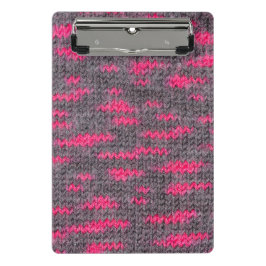 Ullstruktur i sticka med rosa och grått färg