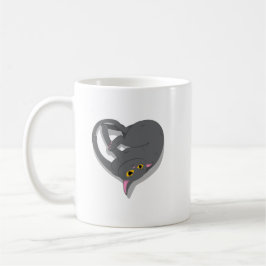 Un chat en forme de coeur. kaffemugg