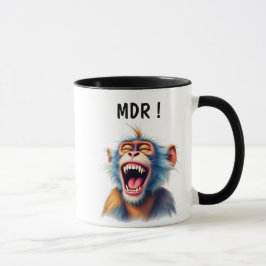 Un singe rigolo mort de rire. mugg