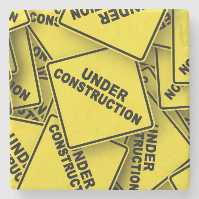 Under konstruktionstecken stenunderlägg (Framsidan)