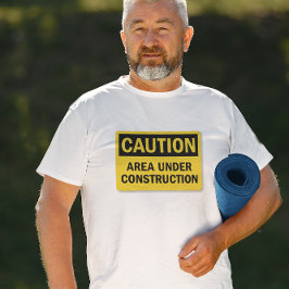 Under uppförande Tee