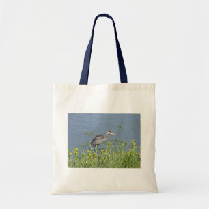 Underbar Blue Heron i floden. Tygkasse