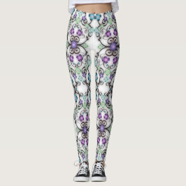 Underbar spetsig look av blå violetta blommor leggings