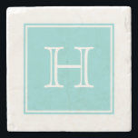 Underlägg av turkos kvadrat Monogram Stone<br><div class="desc">Lägg till initialer eller annan text om du vill anpassa den här enkla och moderna kvadratmonogramstenen som Underlägg i turkos och vitt. Det här trendiget och den här chicen underlägg skulle ge en perfekt.</div>