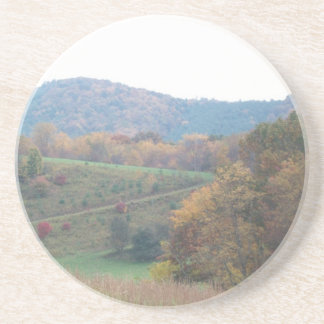 underlägg med härliga berg av nc sandsten