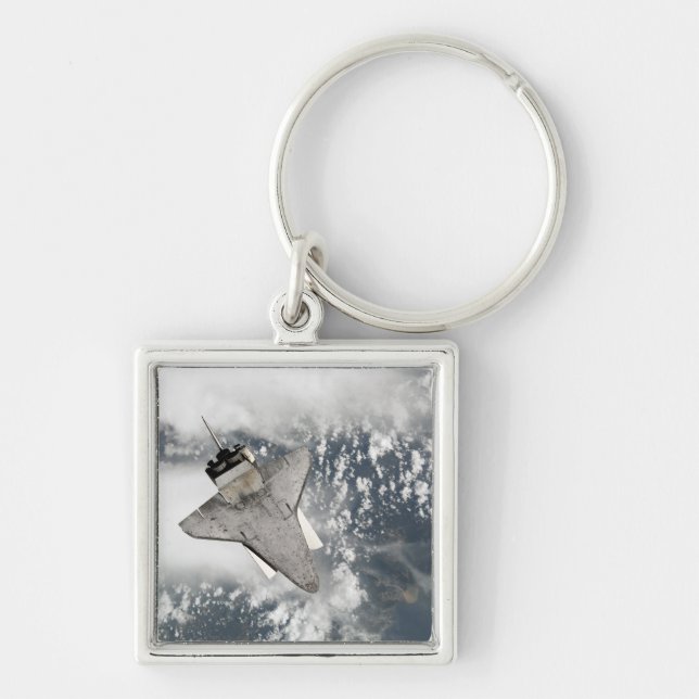 Undersidan av rymdens skyttelsökning fyrkantig silverfärgad nyckelring (Framsidan)