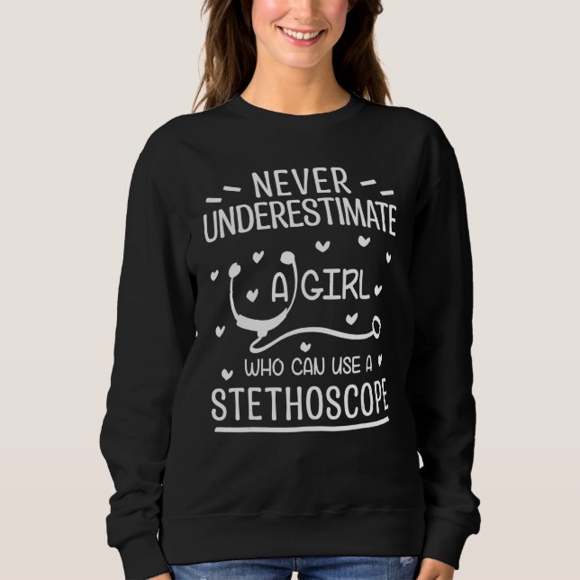 Underskatta aldrig en flicka som kan Använda ett s T Shirt (Framsida)