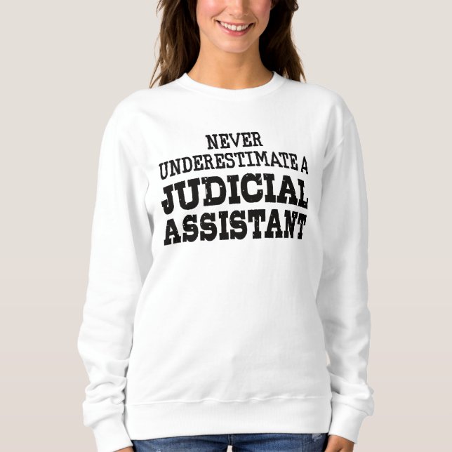 Underskatta aldrig en juridisk assistent t shirt (Framsida)