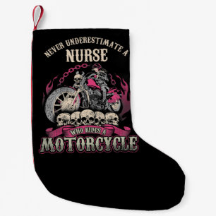 Underskatta sjuksköterska som rider motorcykelns B Liten Julstrumpa