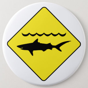 Undertecknar varnande hajar för gult "knäppas knapp