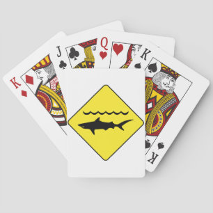 Undertecknar varnande hajar för gult "pokerdäcket spel kort