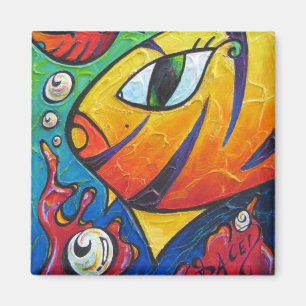 Undervattens- clown omkring magnet