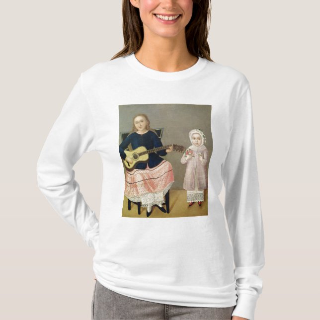 Ung flicka med en gitarr och ett barn med a t shirt (Framsida)