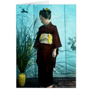 Ung japansk flickavintage räcker den kulöra hälsningskort