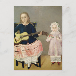 Unga flickor med en gitarr och barn med en vykort