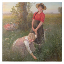 Unga flickor Picking Flowers