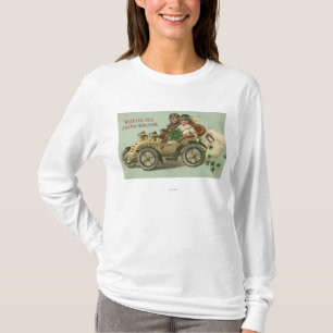 Ungar i en bil med Shamrocks T-shirt
