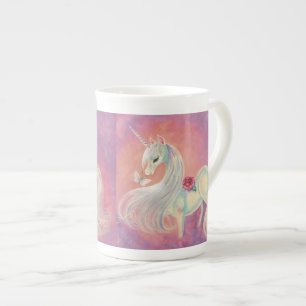 Unicorn i rodnad av gryning benporslin mugg