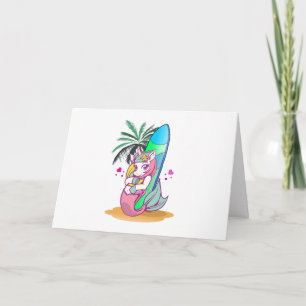 Unicorn med surfboard på stranden kort