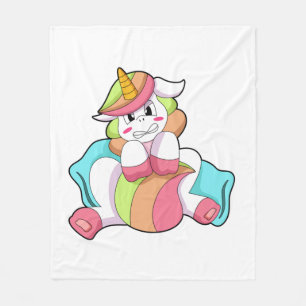 Unicorn Shy med Pillow Fleecefilt