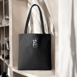Unik Snyggt Namn och Monogram Typografi svart Tygkasse<br><div class="desc">En vacker tote-väska med en elegant snyggt med ditt namn och monogram med klassiska seriffer och en mer ornerad manustypografi i en balanserad och symmetrisk harmoni. De tre inslag blandas ihop med en sofistikerad harmoni och skapar din egen logotyp för personlig märkning. Här visas chicens svarta bakgrund med monogram inslag...</div>