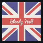 Union Jack Flagga med Funny Quote Stenunderlägg<br><div class="desc">Den färgstarka rödvita och blå Union Jack-flagga från Förenade kungariket visade här med ett lustigt slang svär ord citat, "Bloody Helvete". Ord blodig... är en korruption av Guds blod, en fras som användes så långt tillbaka som 1700-talet... helvetet tillkom senare. Detta idiom är ett mycket informellt och oförskämt sätt att...</div>
