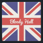 Union Jack Flagga med Funny Quote Stenunderlägg<br><div class="desc">Den färgstarka rödvita och blå Union Jack-flagga från Förenade kungariket visade här med ett lustigt slang svär ord citat, "Bloody Helvete". Ord blodig... är en korruption av Guds blod, en fras som användes så långt tillbaka som 1700-talet... helvetet tillkom senare. Detta idiom är ett mycket informellt och oförskämt sätt att...</div>