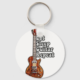 Upprepad sömngitarr. vintage färglös nyckelring