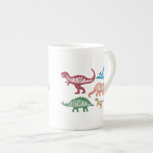 Uppsättning silhuetter av olika dinosaurier benporslin mugg
