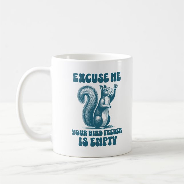 Ursäkta mig att din fågelmatare är tom. kaffemugg (Vänster)