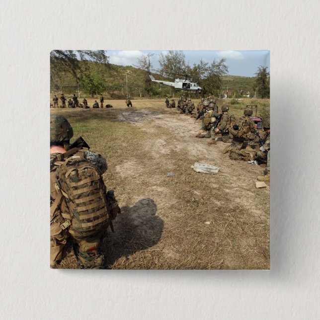 US Marines ger säkerhet som UH-1N Knapp (Framsida)