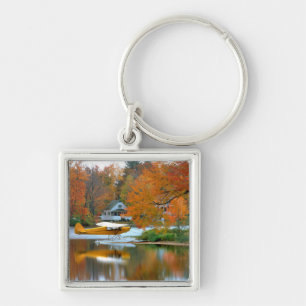 USA, New England, New Hampshire. Flygplan med flot Fyrkantig Silverfärgad Nyckelring