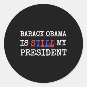 USA: s presidentval T Shirt Obama är fortfarande m Runt Klistermärke