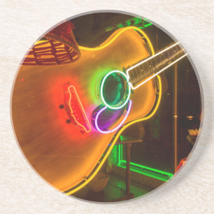 USA, Texas, Austin. Neon Gitarr Vid Utpressning Underlägg Sandsten