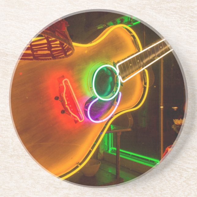 USA, Texas, Austin. Neon Gitarr Vid Utpressning Underlägg Sandsten (Framsidan)