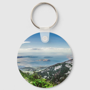 Utsikt över havet från bergen nyckelring