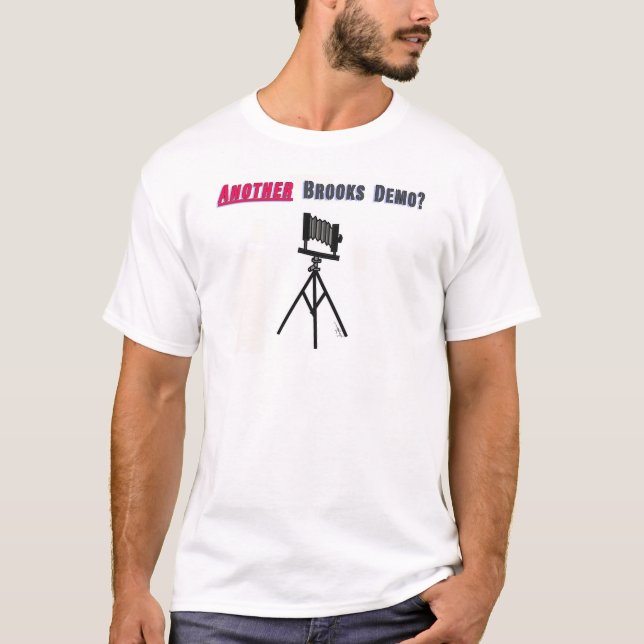 Utslagsplats för bokDemostylin Tee Shirt (Framsida)