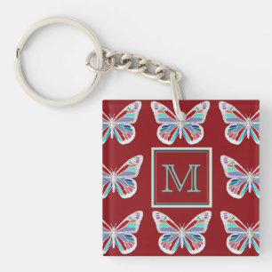 Utsmyckade fjärilar burgundermönster monogram