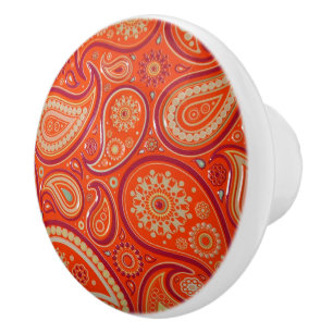 Utsmyckat orange paisley-mönster knopp