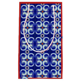 Utsökta blått virvlar runt mönstergåvan hänger lös