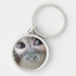 Uttuh orangutan rund silverfärgad nyckelring