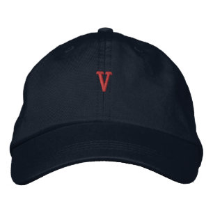 V-symbol broderad keps