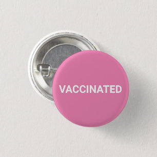 Vaccinerad, vit knapp på rosa