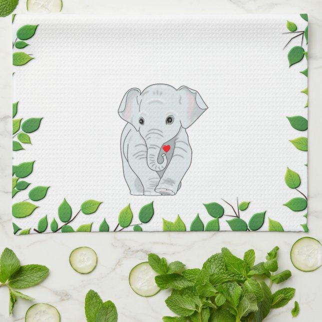 Vacker anpassningsbar elefant och gröna blad på vi kökshandduk (Vikta)
