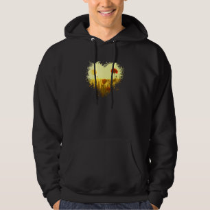Vacker blomsterfält blommar på sommaren i ljust hoodie