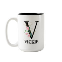 Vacker blomstergravyr med V-monogram