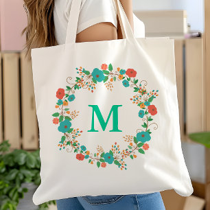 Vacker blomsterkransmonogram tygkasse