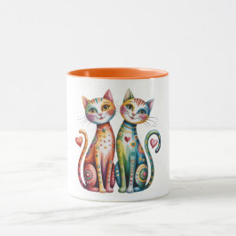 Vacker kaffemugg med färgglada kattpar