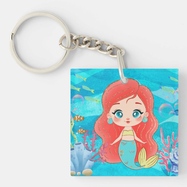 Vacker RED HAIR-sjöjungfru som leker i havet (Framsidan)